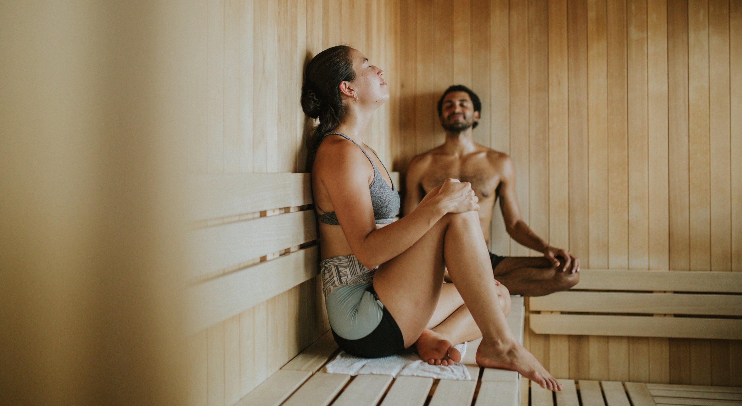 Couple enjoying a sauna together in Sauna House.