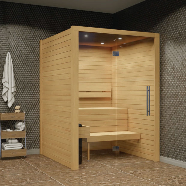 Cala Glass sauna installed in a dark tile bathroom